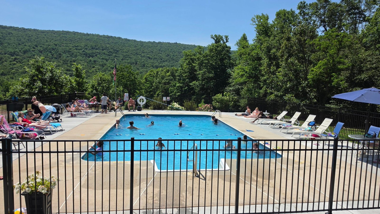 Swimming pool with new fencing at Back Roads Camping & RV Resort